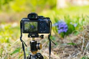 Black Dslr Camera on a Tripod