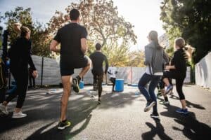 group of people doing routine exercises