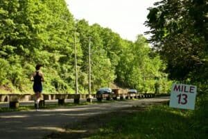 person running near road